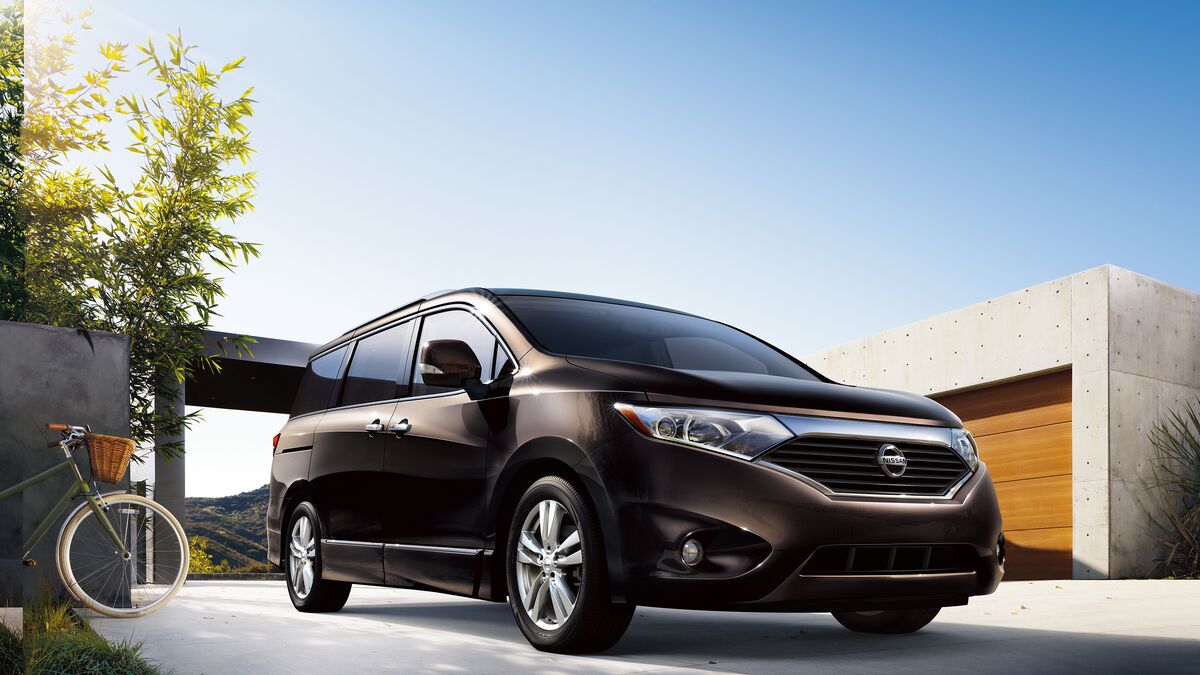 2015 Nissan Quest parked in a driveway.
