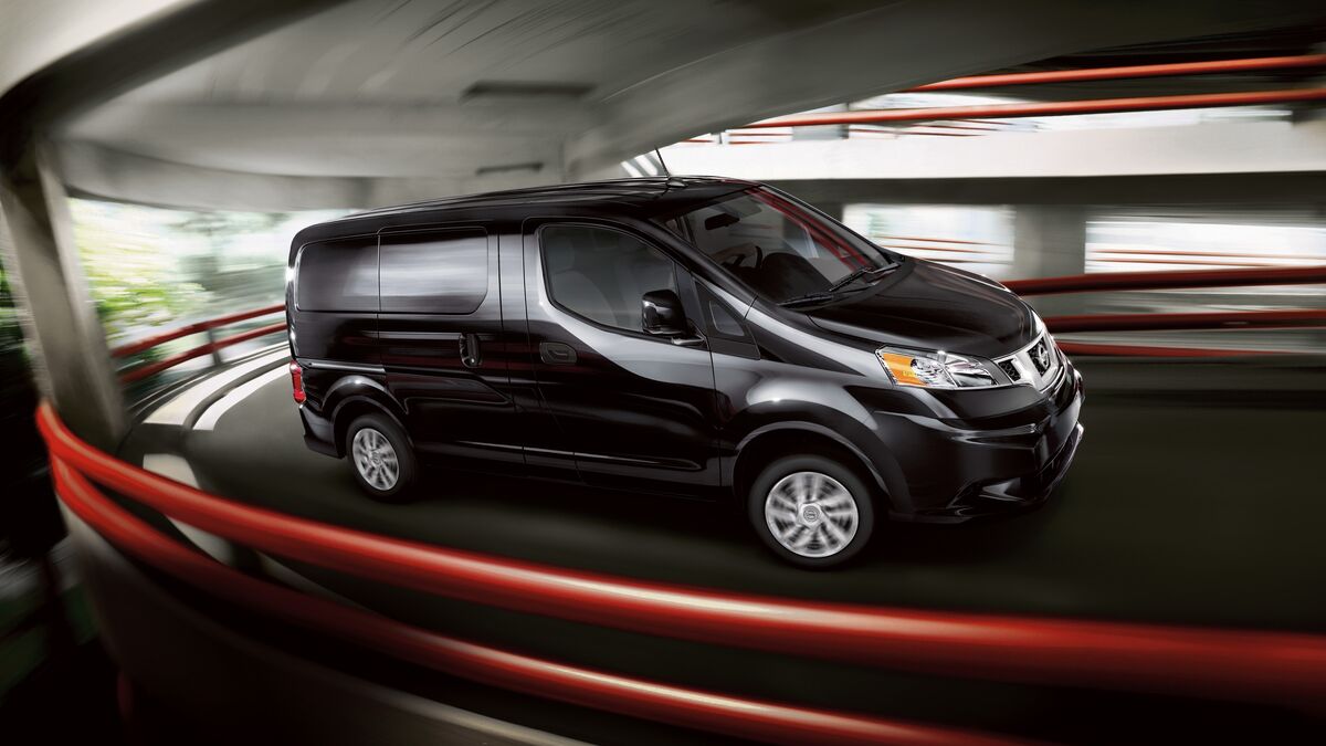 2017 Nissan NV200 on the road.
