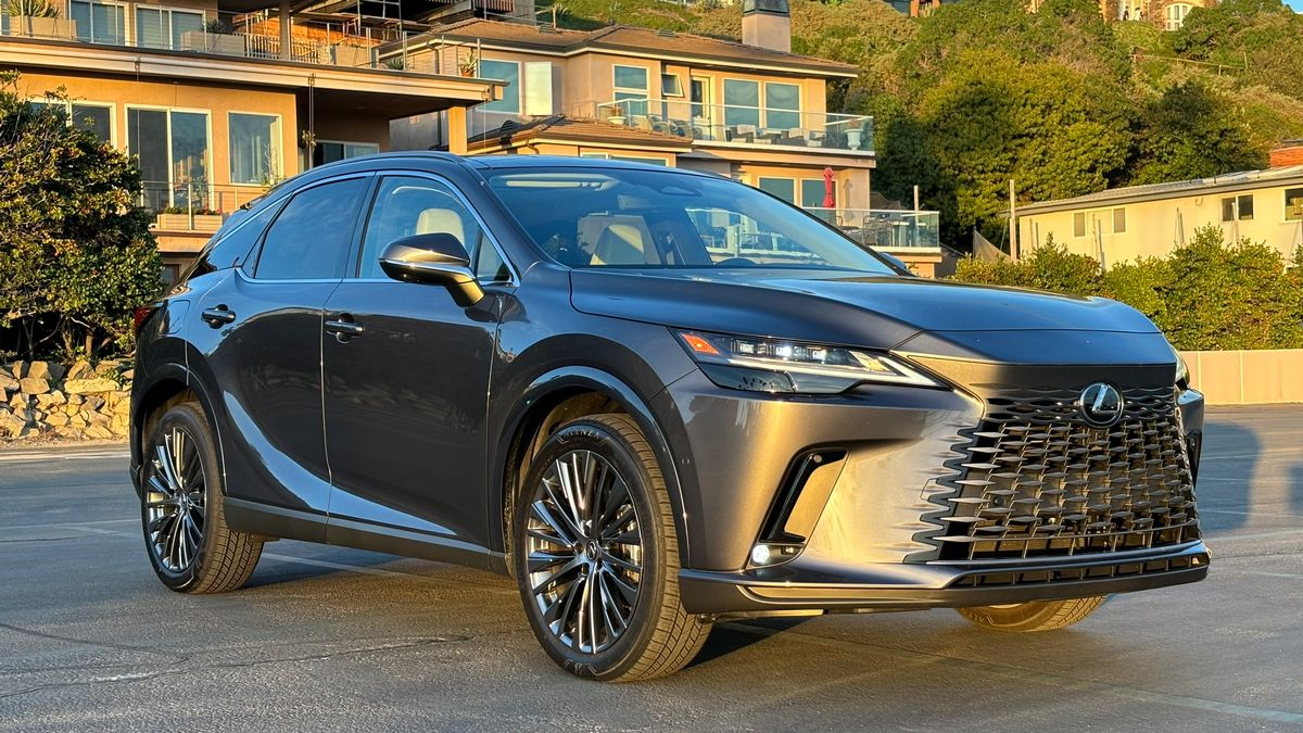 2024 Lexus RX parked in front of a building.