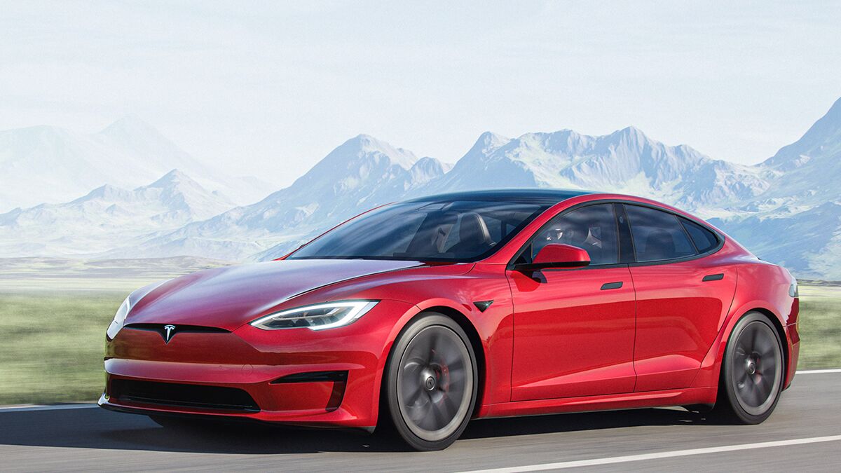 2021 Tesla Model S in red on the road.